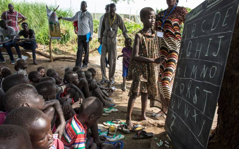 Children in outdoor class in South Sudan. Image credit: United Nations Mission in South Sudan via Flickr (CC BY-NC-ND 2.0)