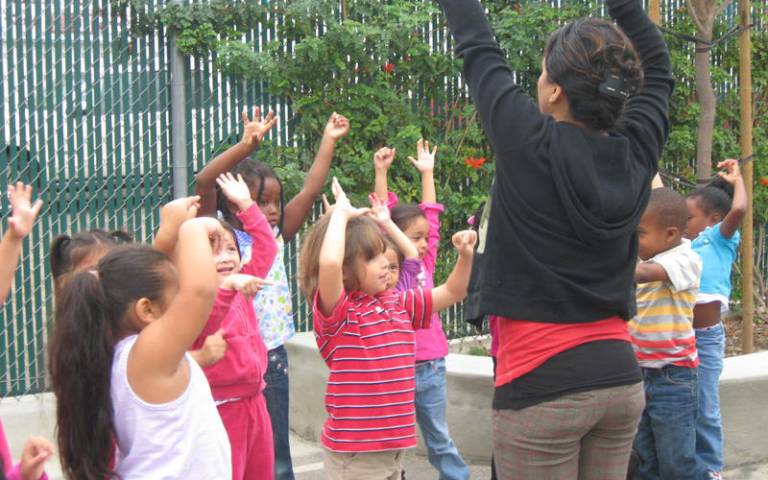 Children doing a warm up exercise