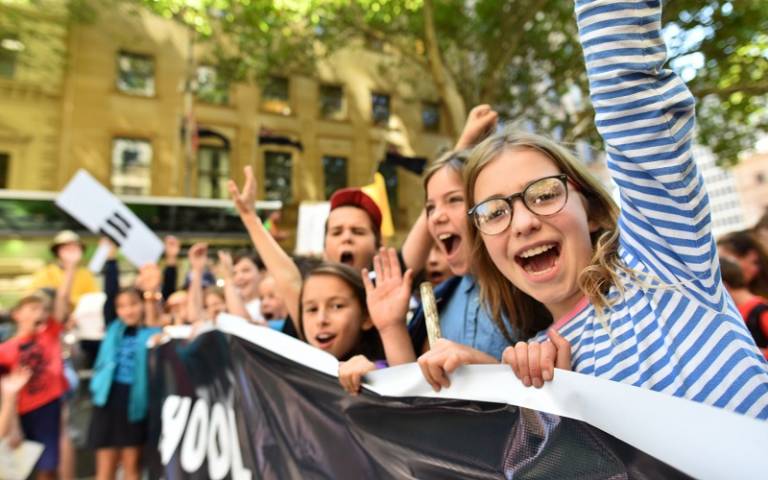 Children holding banner at climate change protest