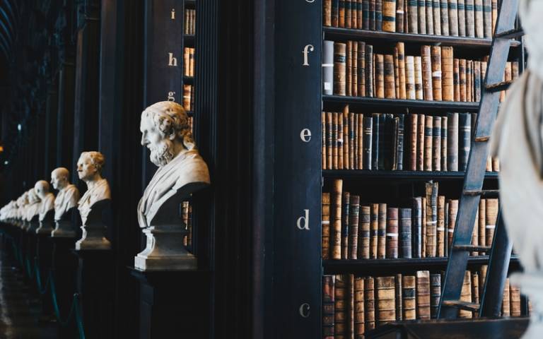 scholar busts in library