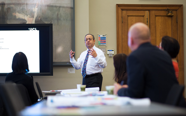 Man wearing a shirt and tie leading a life learning session. Credit: Alejandro Walter Salinas Lopez, UCL Digital Media