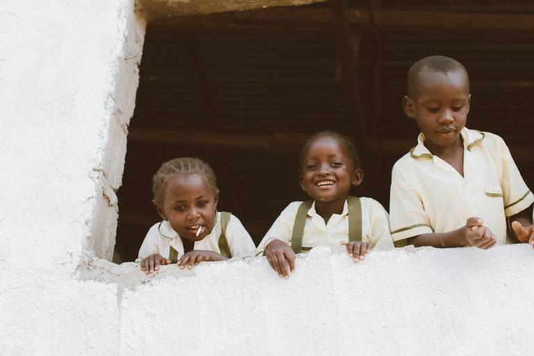 School children in Africa. Photo by Adrianna Van Groningen on Unsplash
