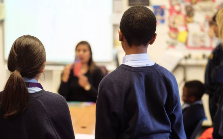Two school children with teacher. Image: Phil Meech for UCL Institute of Education