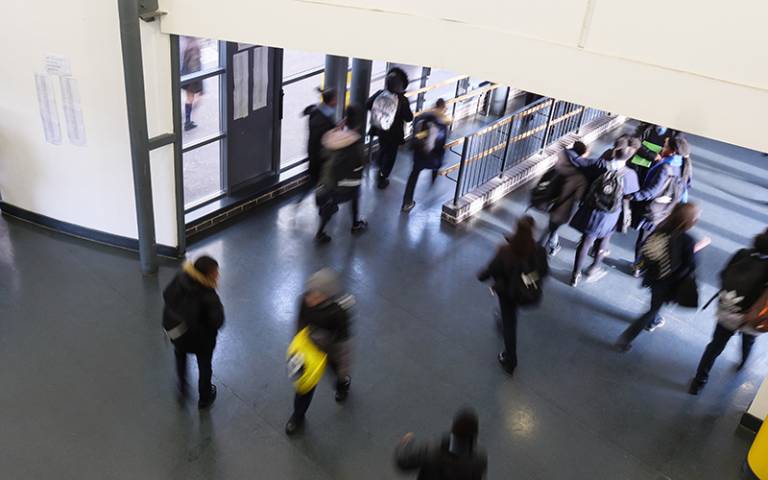 Rush of pupils leaving the school entrance at home time. Image by Phil Meech for UCL