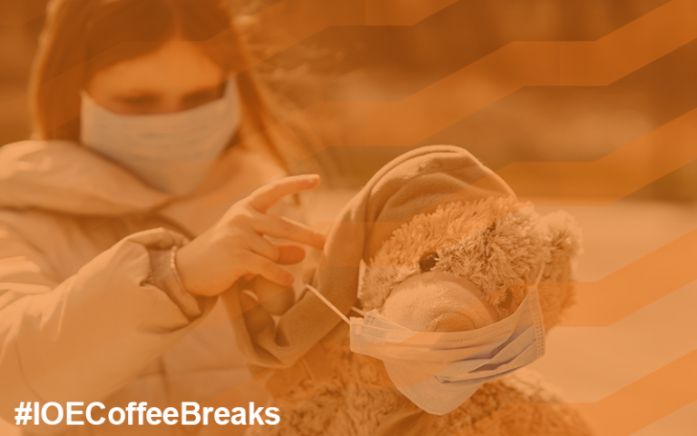 #IOECoffeeBreaks on image of a girl dressing a teddy bear in a disposable face mask