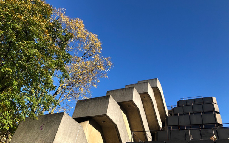 Concrete staircase at an extreme angle against a vivid blue sky. Credit: Sarah-Jane Gregori, UCL IOE