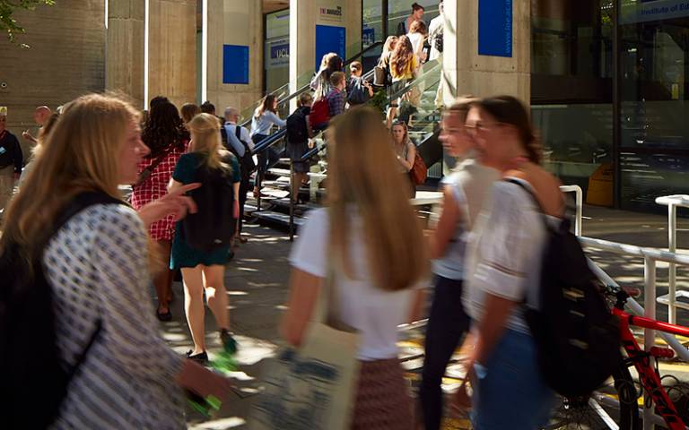 Students outside the entrance of the IOE building