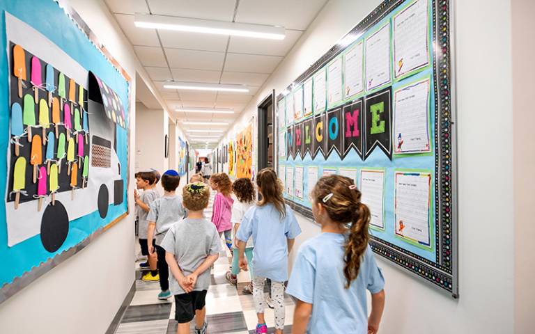 Children line up in a corridor of a yeshiva (Jewish school). (Photo: Ashok Sinha / Adobe Stock)