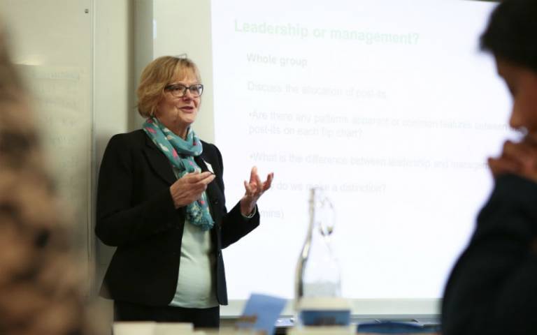 Woman delivering class on leadership