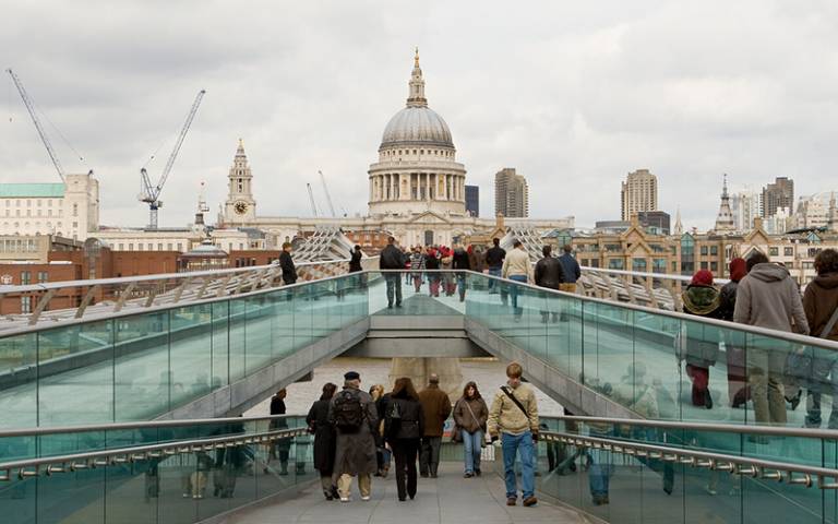 People walking on London's Millennium Bridge in the foreground. St Paul's Cathedral is in the background (Photo by Mary Hinkley, UCL Digital Media)