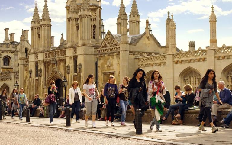 People walking in front of King’s College Gatehouse, Cambridge. Image by Kosala Bandara via Flickr (CC BY 2.0).