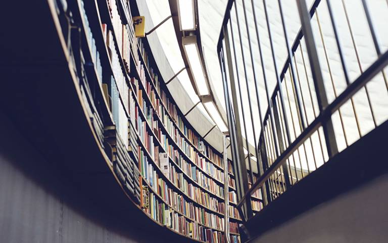 Library shelves. Pexels.