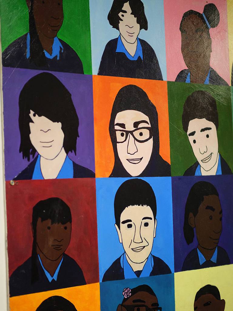 Portrait artwork by pupils at Gladesmore Secondary School. Photo by Phil Meech