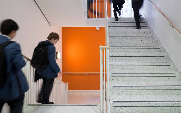 School students walking up and down stairs (Photo: UCL Digital Media)