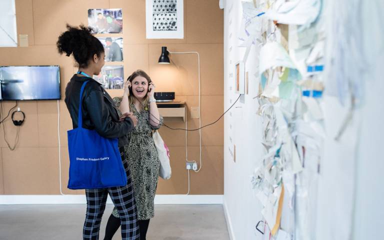 People looking at work in the Resist exhibition by PGCE Art and Design students © Hydar-Dewachi