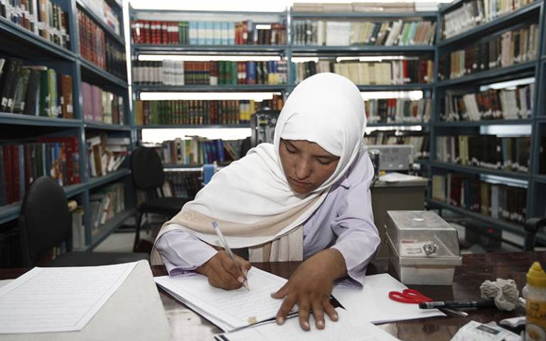 Woman studying in Balkh University library, Afghanistan. Image: Sandra Calligaro / Taimani Films / World Bank (CC BY-NC-ND 2.0)