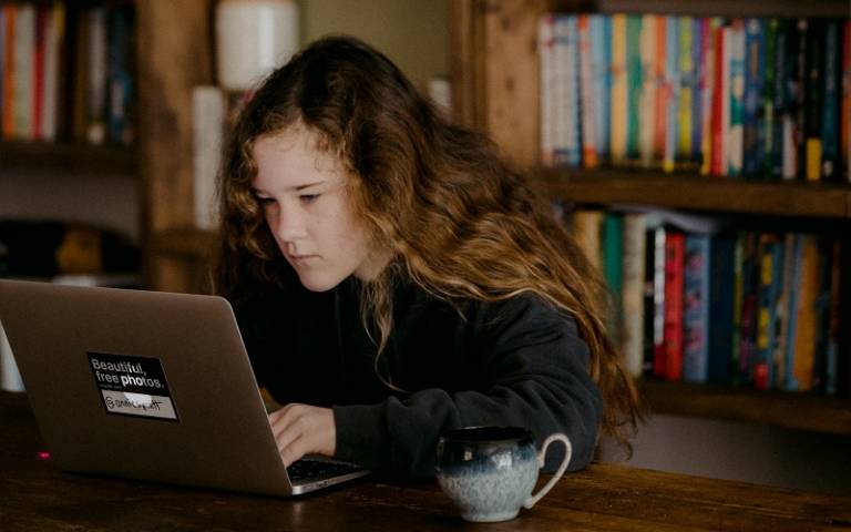 Teenager doing schoolwork at home. Image: Annie Spratt via Unsplash.