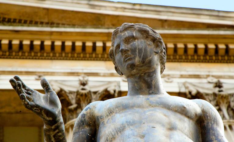 UCL Portico statue