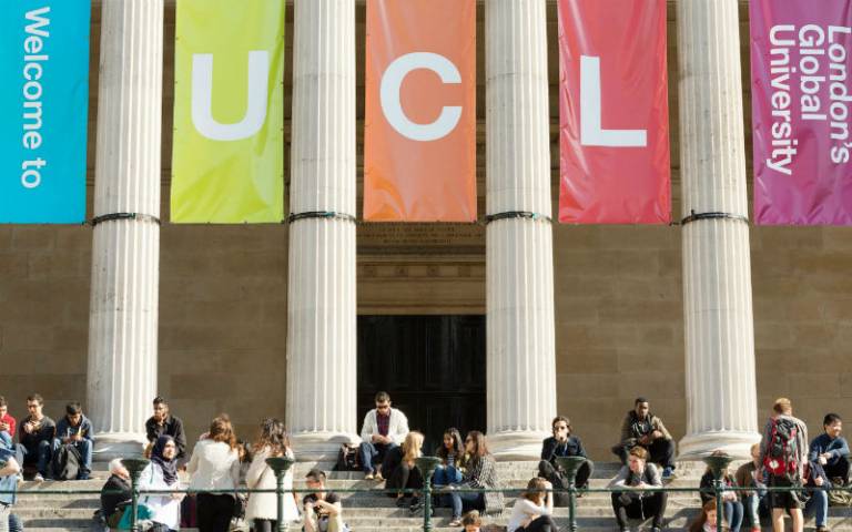 UCL banners in front of the Wilkins Building on the UCL campus