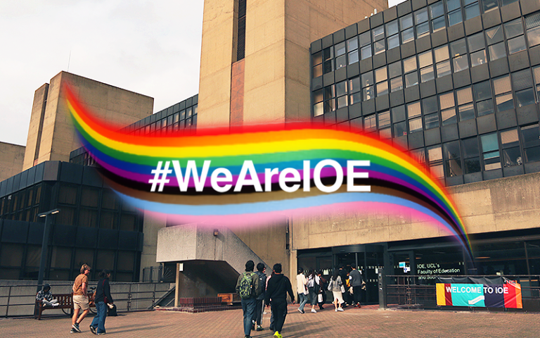 A paint streak in the colours of the equity flag is in the centre of a photo of the IOE level 4 entrance and concourse. Students walk towards the entrance. On top of the paint streak are the words, #WeAreIOE. Image credit: IOE Communications.