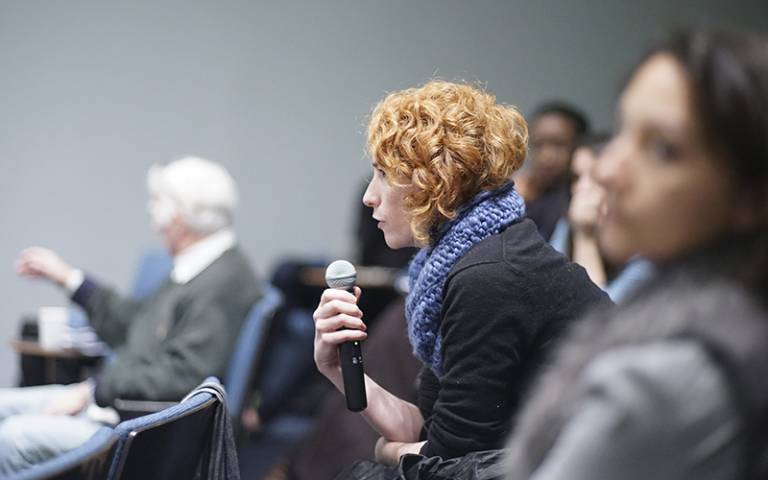 Woman in audience asking a question. Image: Justin Lui via Flickr (CC BY 2.0)