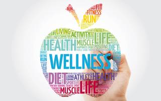Wellness apple word cloud with marker. Image by dizain / Adobe Stock.