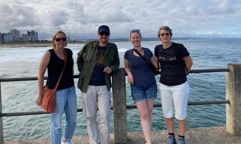 Greg, Clare, AK, and Petra by the sea in South Africa, Nov 2022