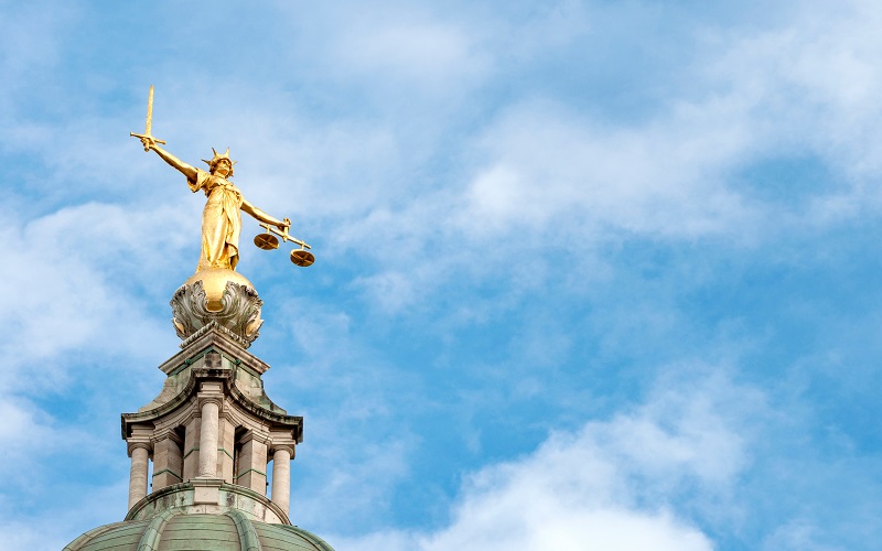 Statue of lady justice on top of the Old Bailey