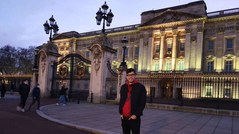 Ramtin UCL IPM student outside Buckingham Palace