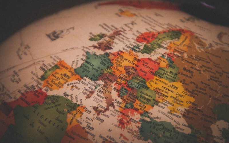 A close up of a vintage globe showing Europe 