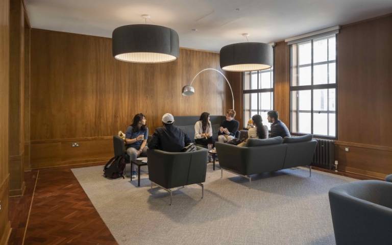 A group of six students sitting on sofas in the Cissy Chu common room in Bentham House 