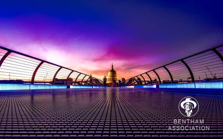 Image of St Paul's Cathedral with a sunset sky viewed from the Millenium bridge