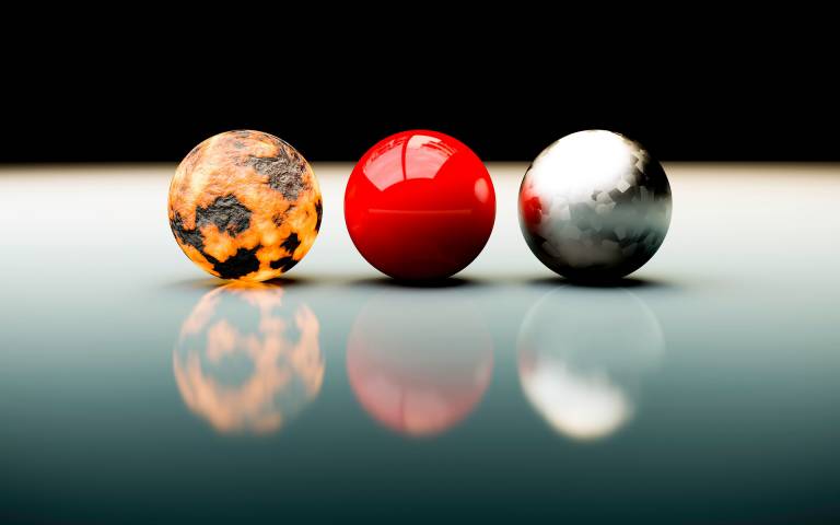 Image of three different coloured balls