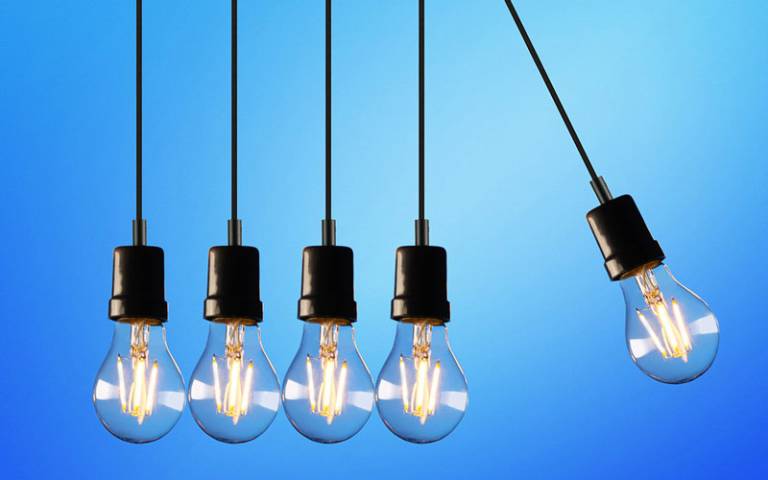 IMAGE: lightbulbs swinging
