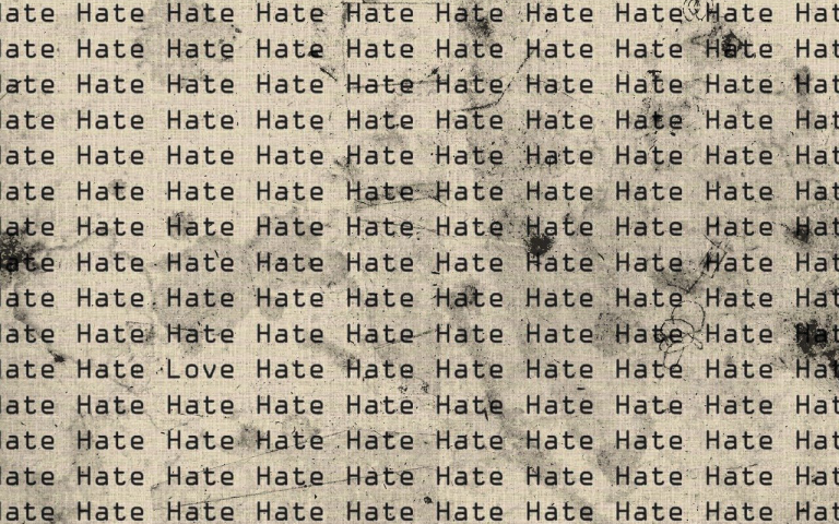 Illustration of the word 'hate' repeatedly typed