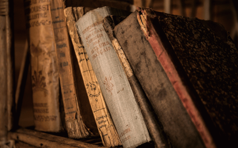 Image of old books on a shelf