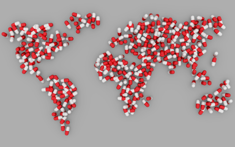 Image of a map of the world made out of medicine pills
