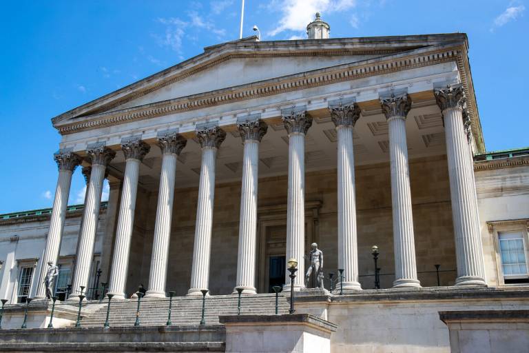Portico building on UCL campus with blue sky in the background