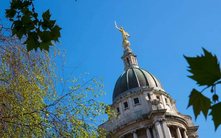 Status of Lady Justice at the top of the Old Bailey in Central London