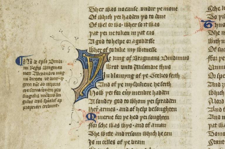 A close up of a Middle English manuscript.  Deep blue and gold decorates black gothic writing.