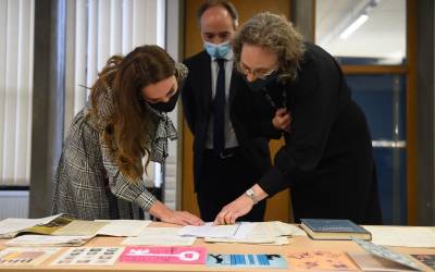 The Duchess of Cambridge and UCL colleagues browsing items from the UCL Institute of Education Archives