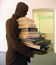Statue with books