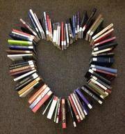 Books laid out in a heart shape