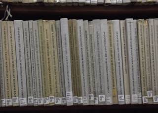 Books of the Yates collection, on a shelf