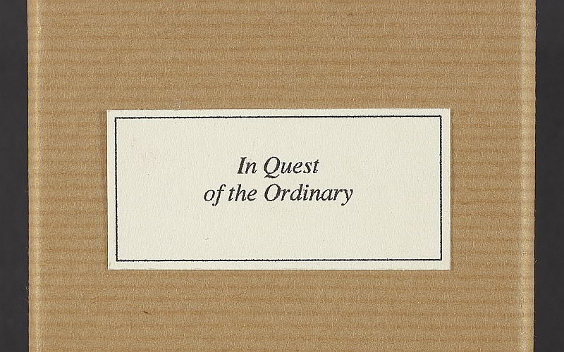 A box lid that says ‘In Search of the Ordinary.’
