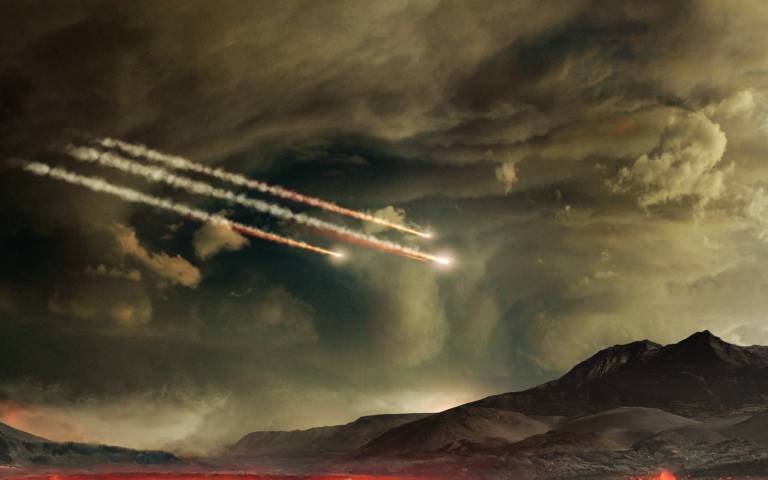 An artist’s conception of early Earth bombarded with asteroids. Credit: NASA's Goddard Space Flight Center Conceptual Image Lab.