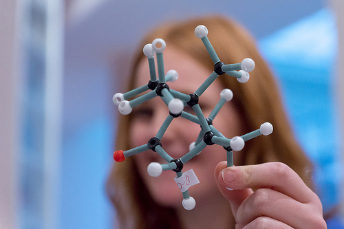 Woman holding model of a molecule. Credit: D. Lewis (UCL Chemistry)…