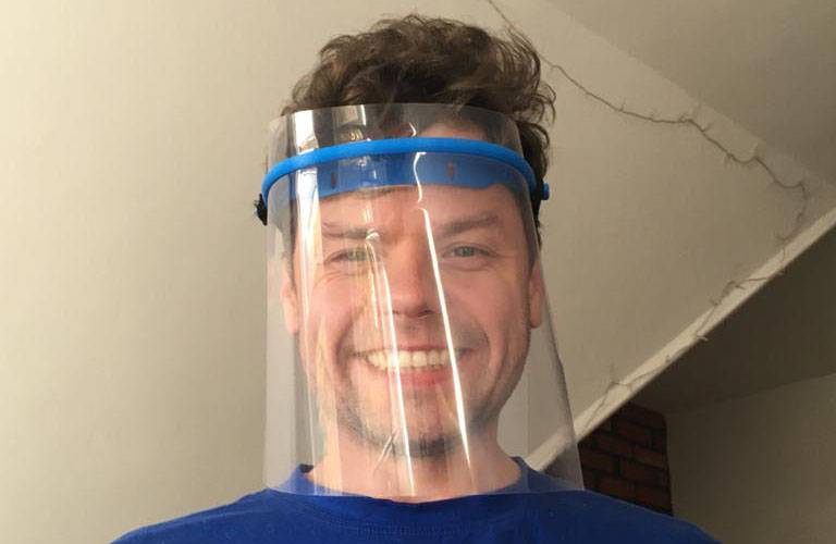 Dr Daniil Nikitichev wearing a 3D Printed face visor