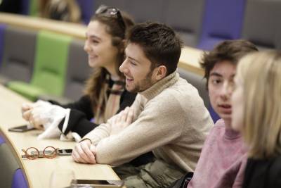 student in the lecture theatre at our student award celebration