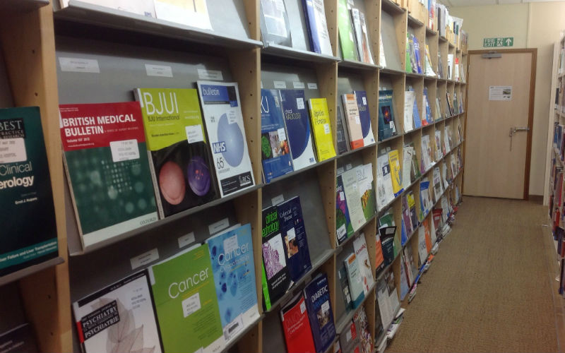 Image of journals on shelves